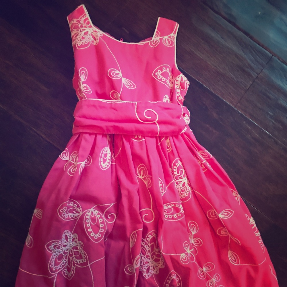 Girls dress. Beautiful stitching
